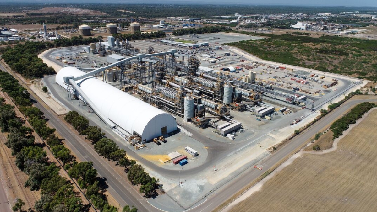 Lithium hydroxide refinery with white dome storage and processing towers